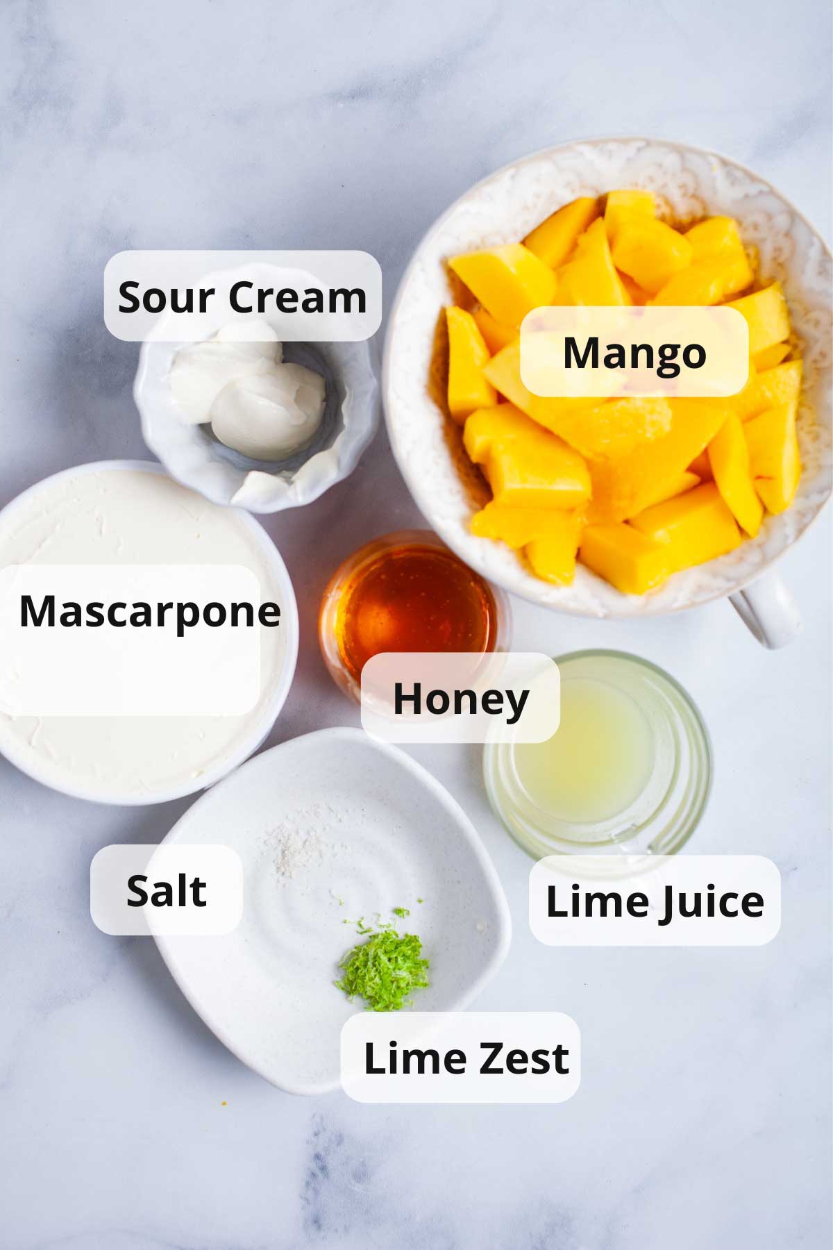 Ingredients to make mango popsicles with mascarpone.