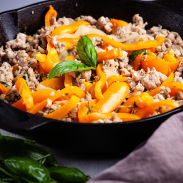 ITALIAN CHICKEN SAUSAGE AND VEGETABLE IN AN IRON SKILLET