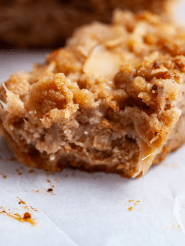 A bite taken out of an almond flour rhubarb bar.
