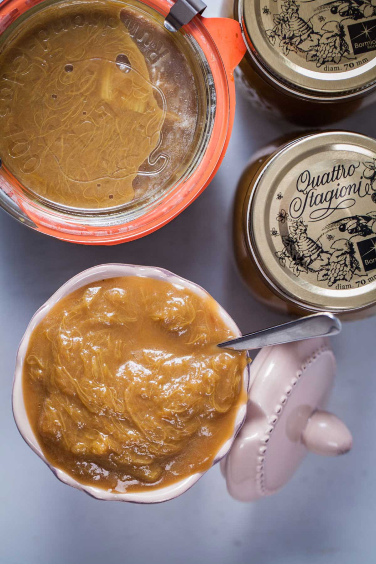 Jars filled with rhubarb compote.