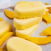 Stacked mascarpone mango popsicles.