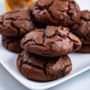 Brownie Peanut Butter Cookies stacked on a plate.