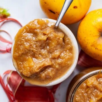 Apple rhubarb compote served in a honey jar.