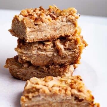 Almond flour rhubarb cookie bars stacked on top of each other.