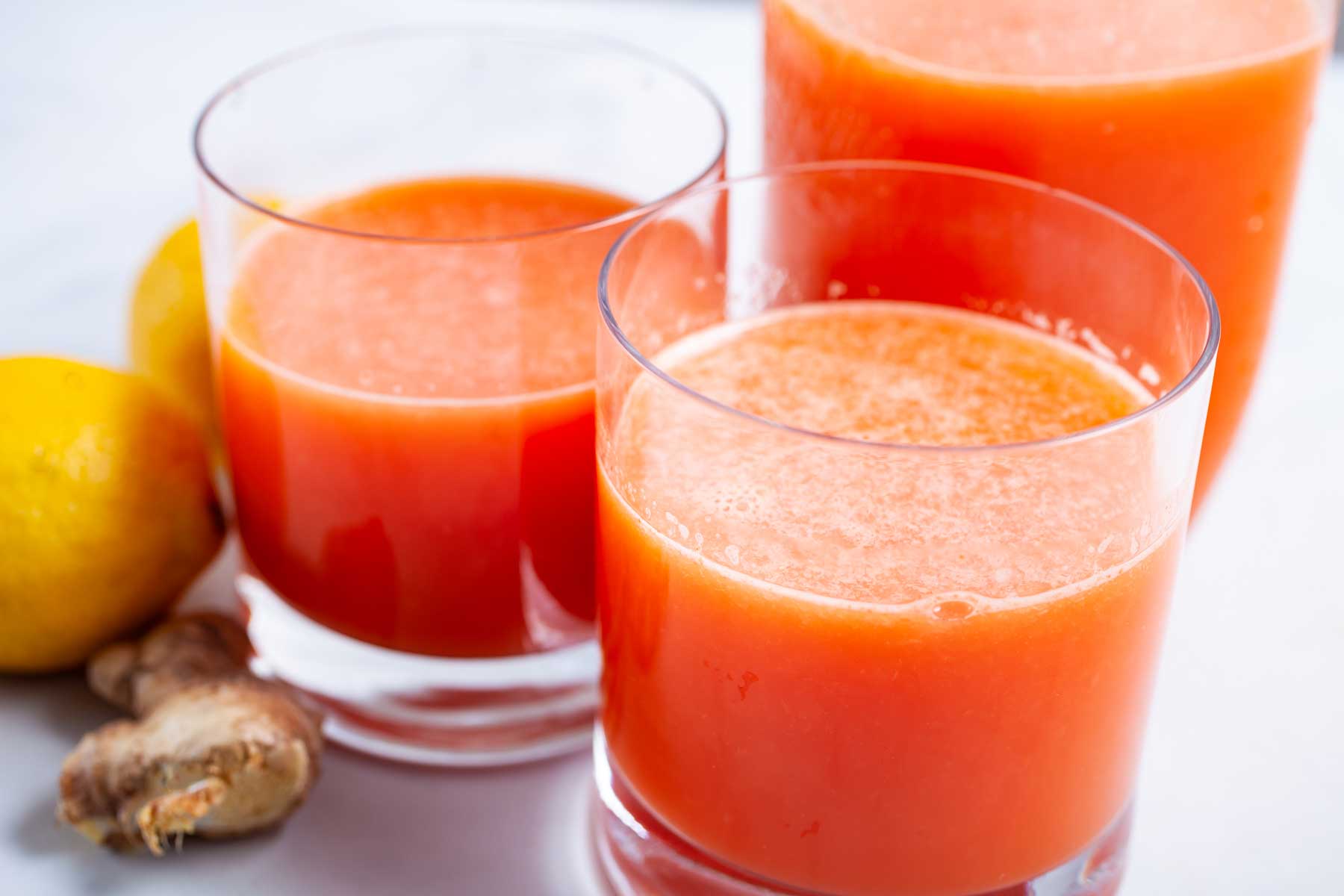 Grapefruit juice served in glasses.