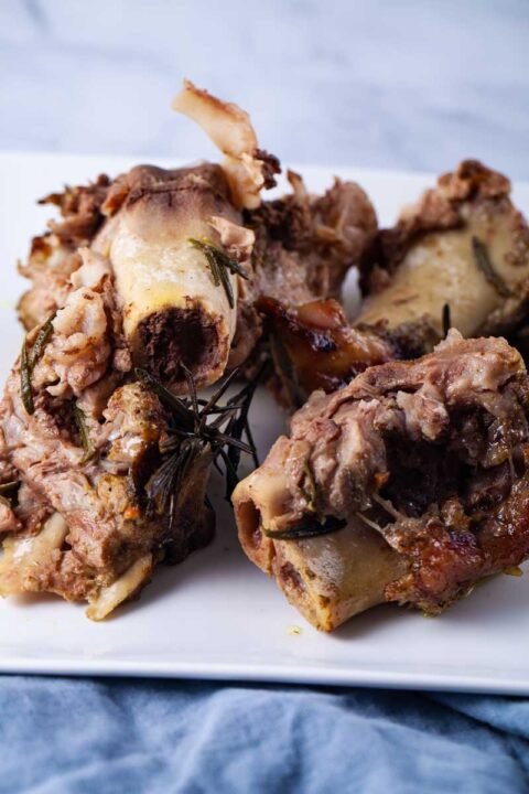 A plate with slow cooked beef bones.