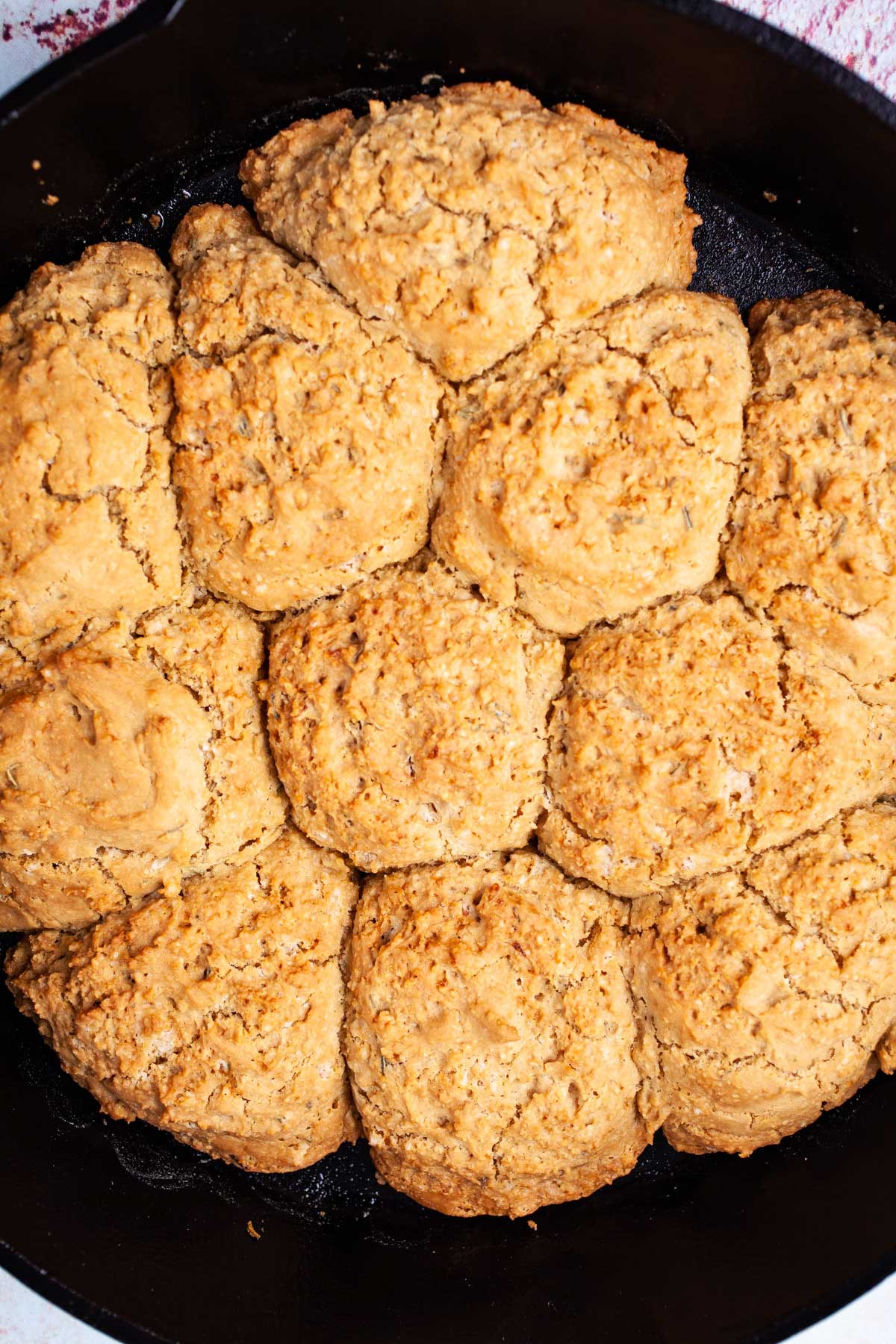 Rosemary Drop biscuits in a cast-iron skillet.