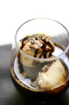 Chocolate caramel affogato in a cup.