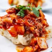 An open Focaccia Sandwich with pan-fried cod fish.
