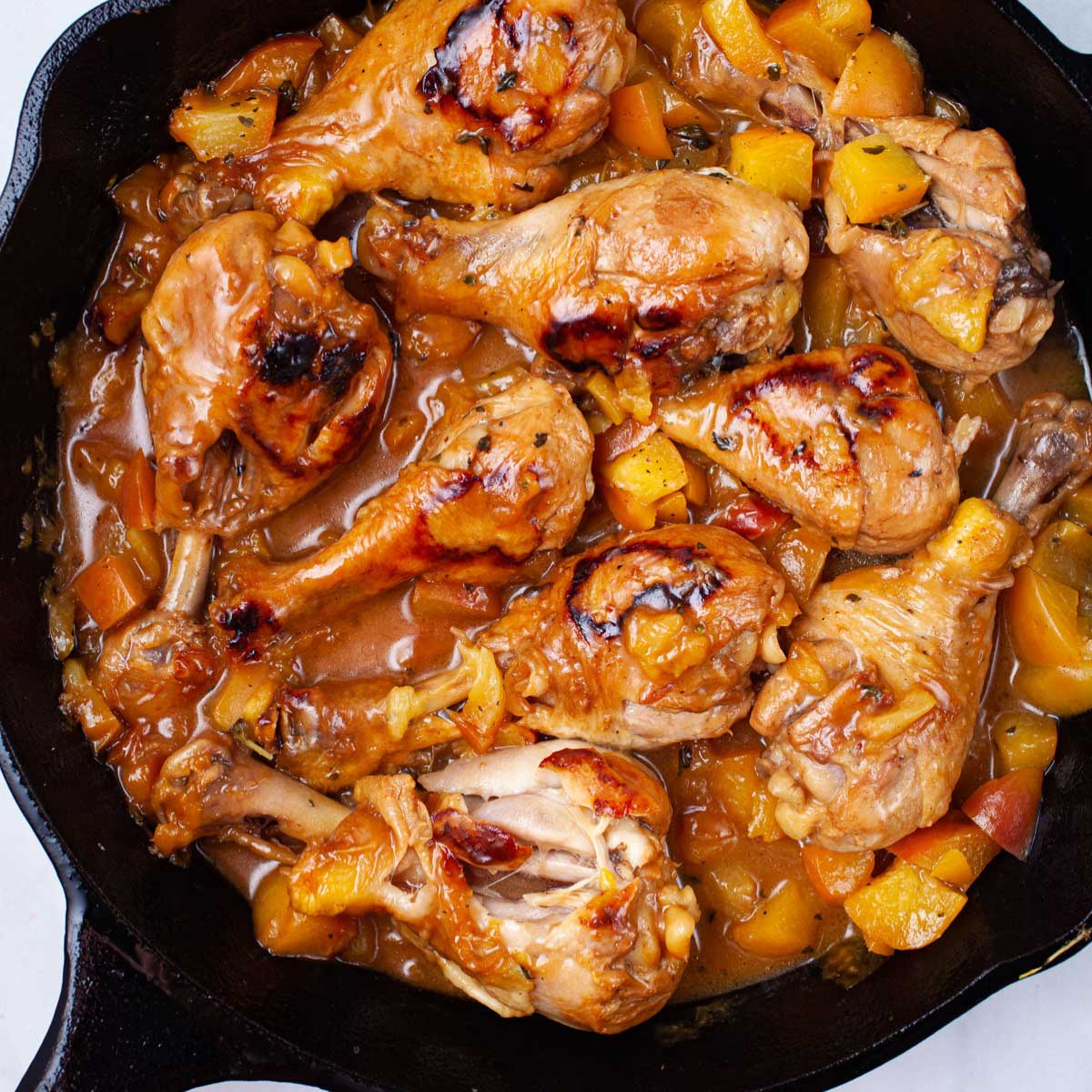 One Skillet Peach Glazed Chicken Legs