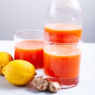 Grapefruit juice served in glasses.