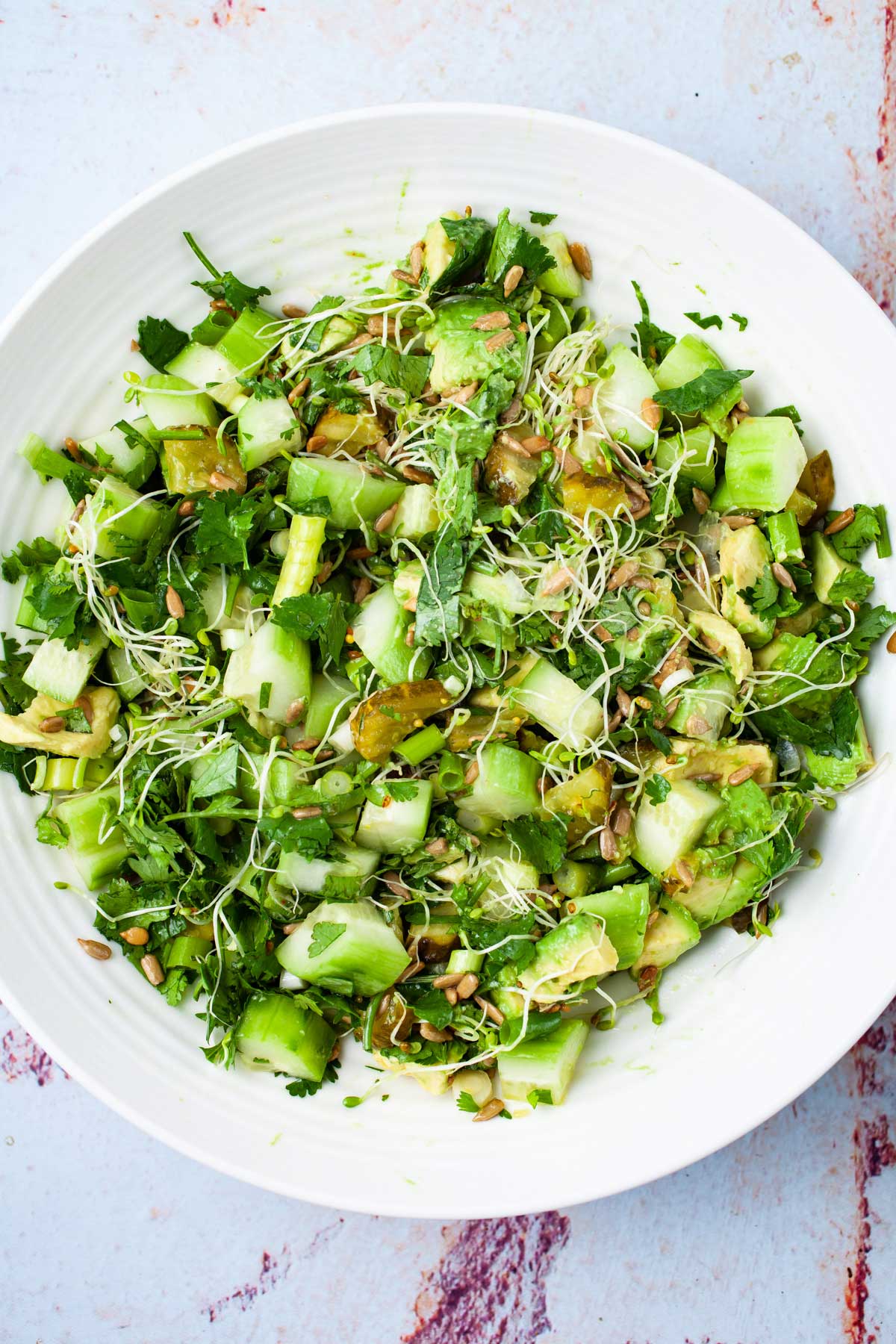 A fresh healthy cucumber salad in a serving bowl.