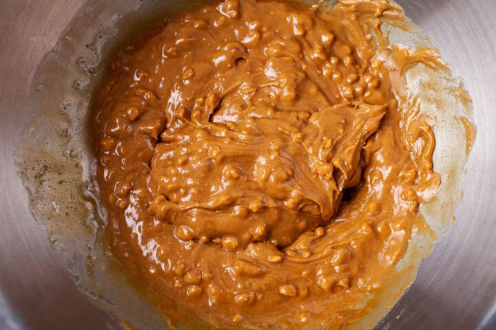 Creamy peanut butter concoction in a stainless steel bowl.