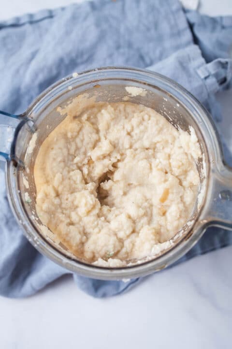 Pureed cauliflower florets in a Vitamix blender.