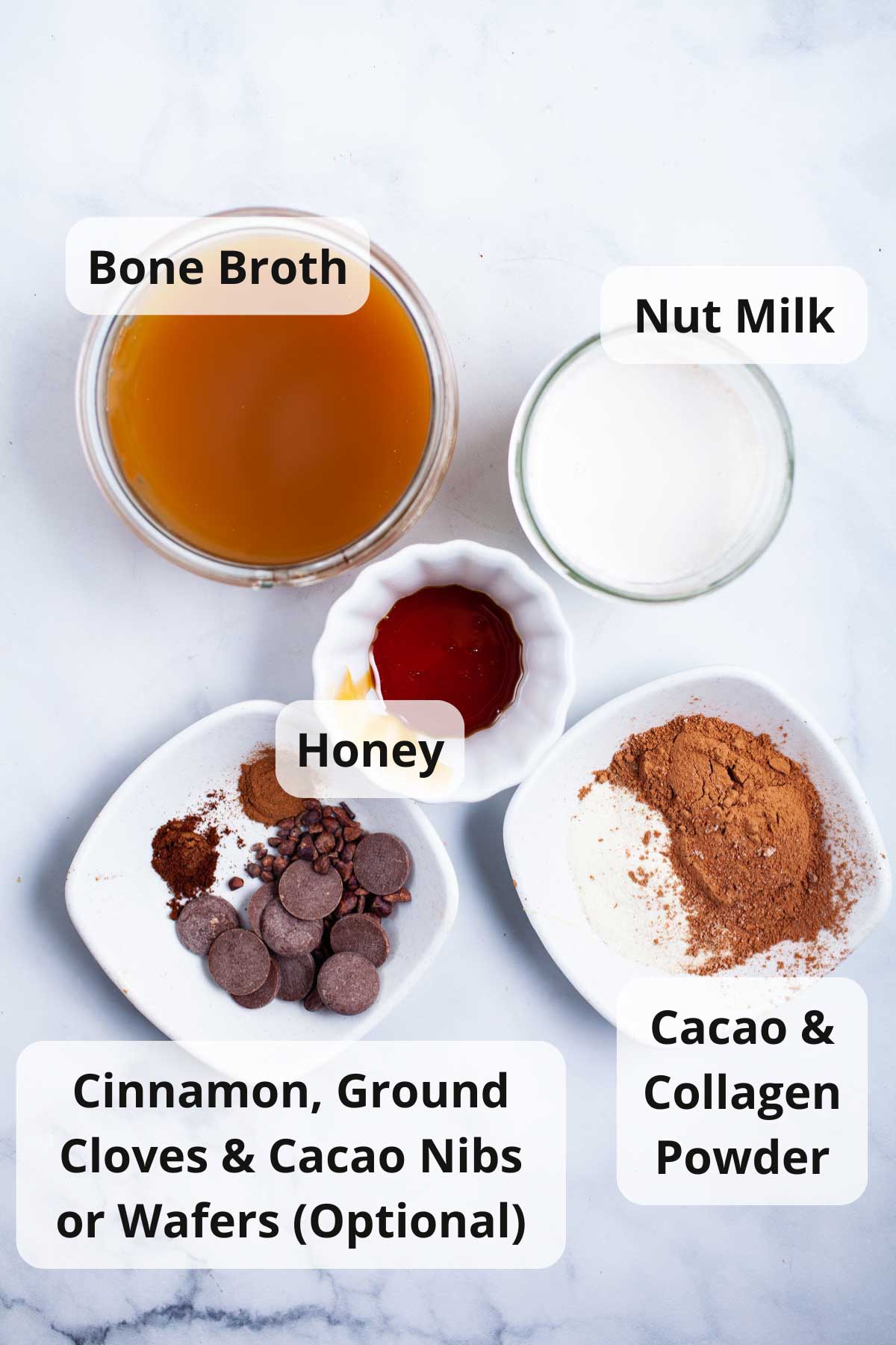 Ingredients on a table to make a bone broth hot chocolate.