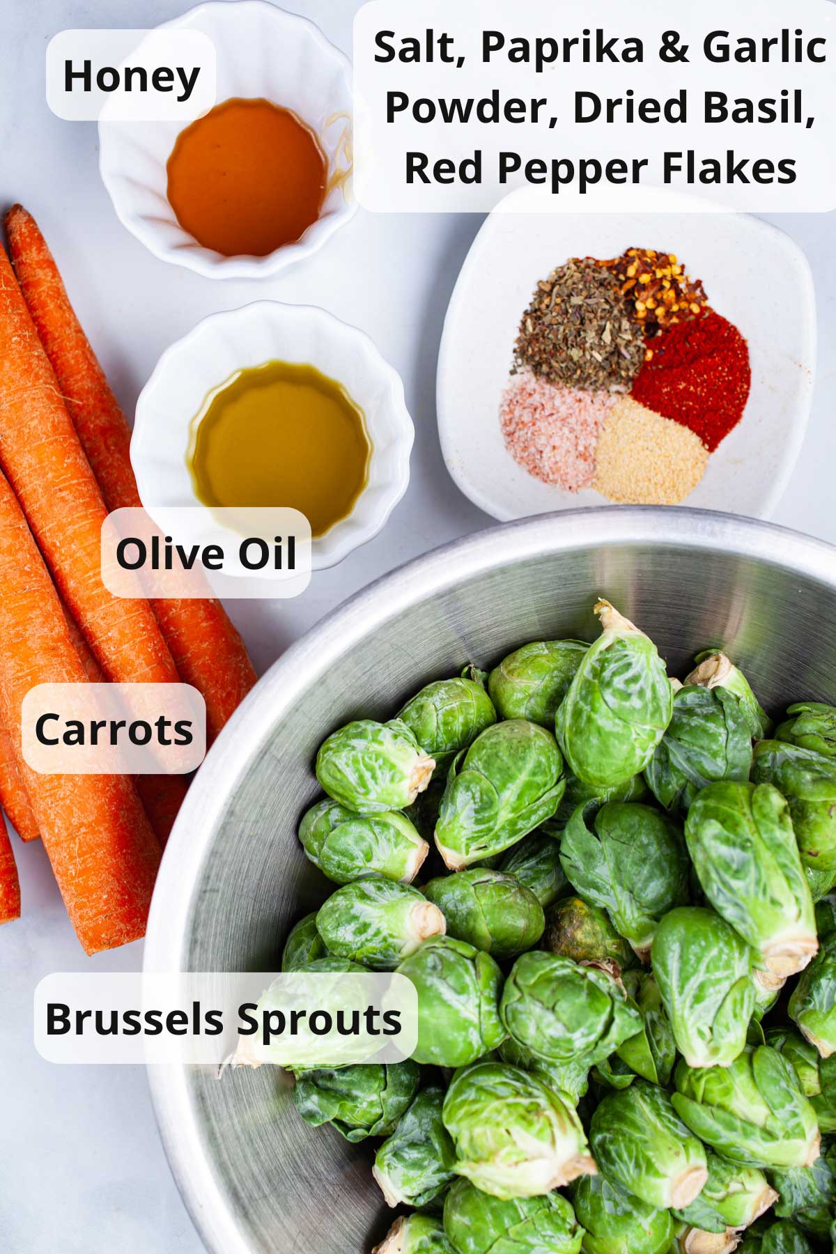 Ingredients to make roasted Brussels sprouts with carrots.