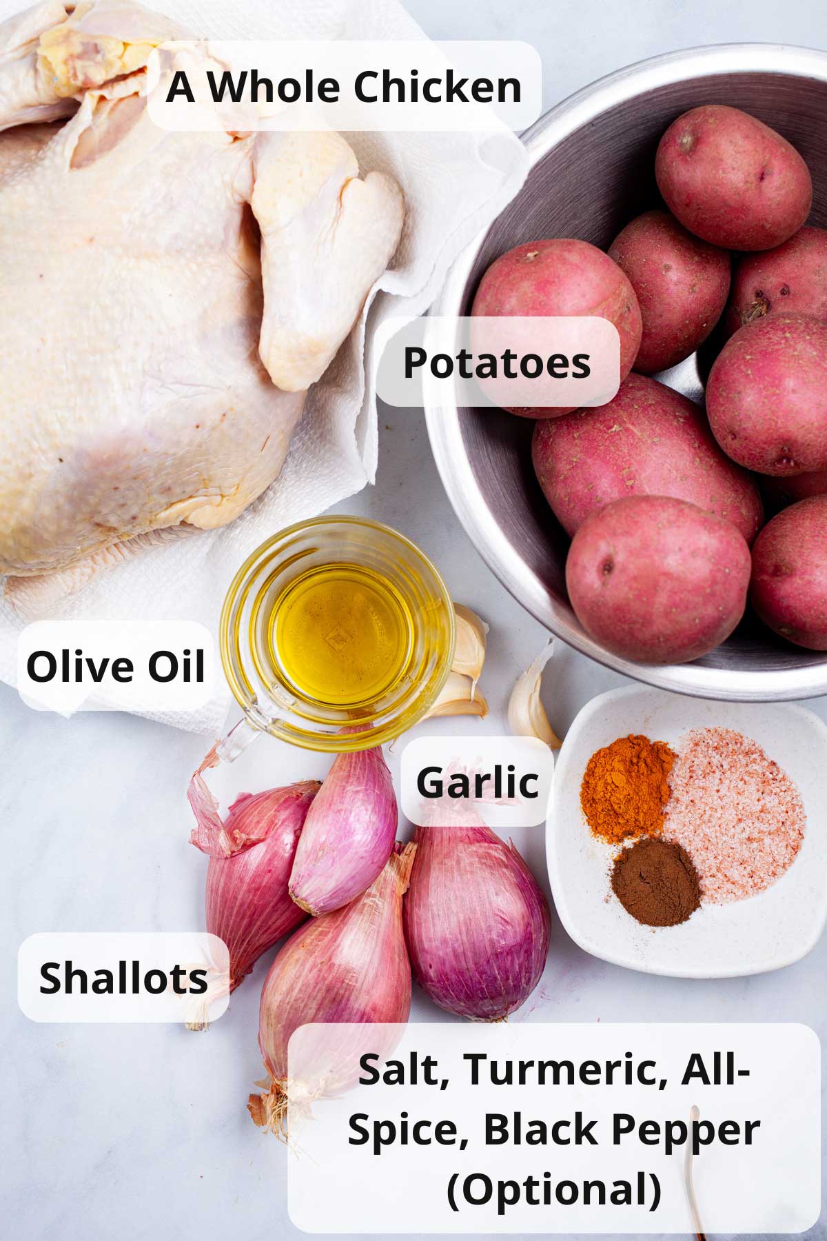 Ingredients on a table to make slow cooker chicken and potatoes.