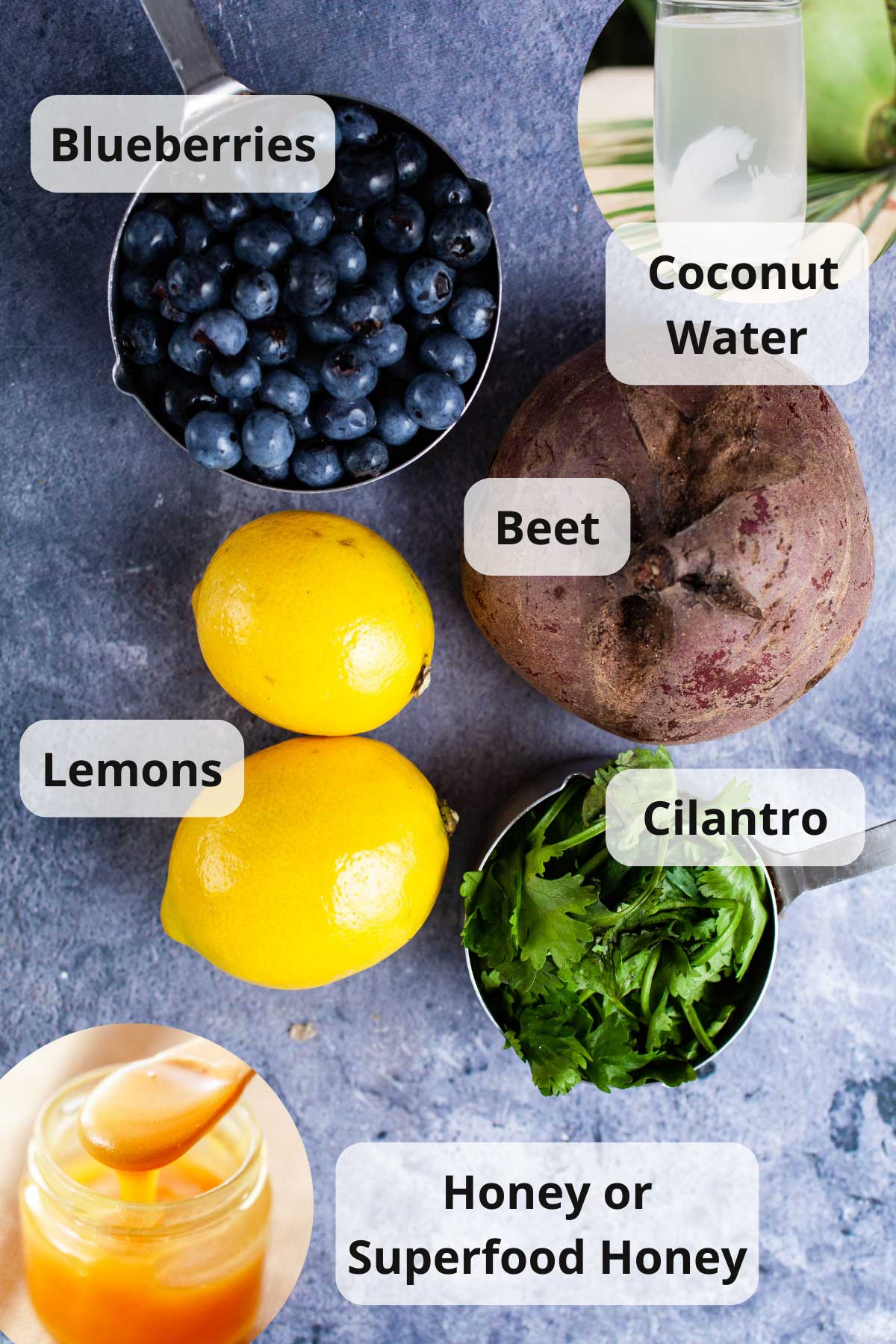 Ingredients to make beet blueberry smoothies on a table.