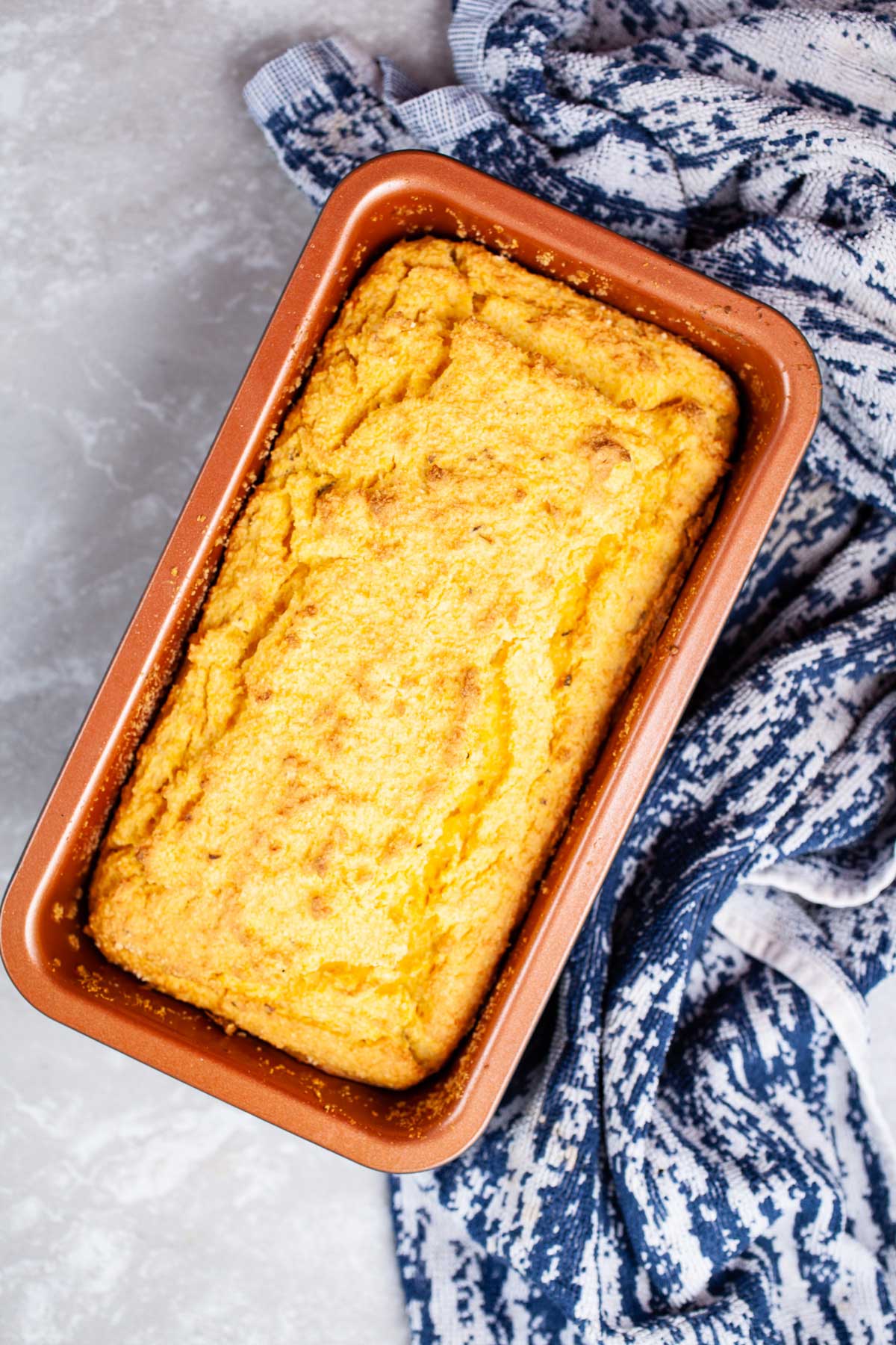 Baked lupin bread in a baking pan.