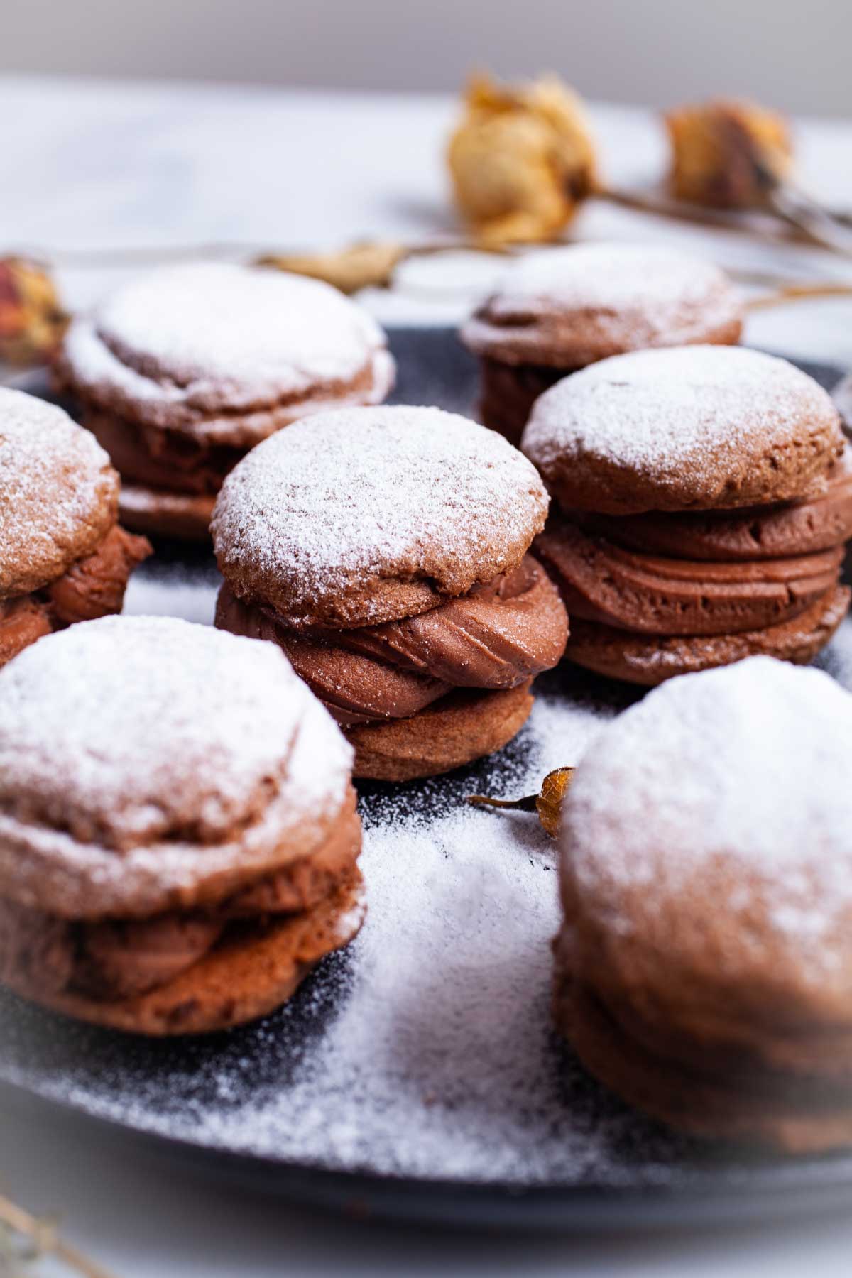 A large plate with festive mascarpone filled sandwich cookies.