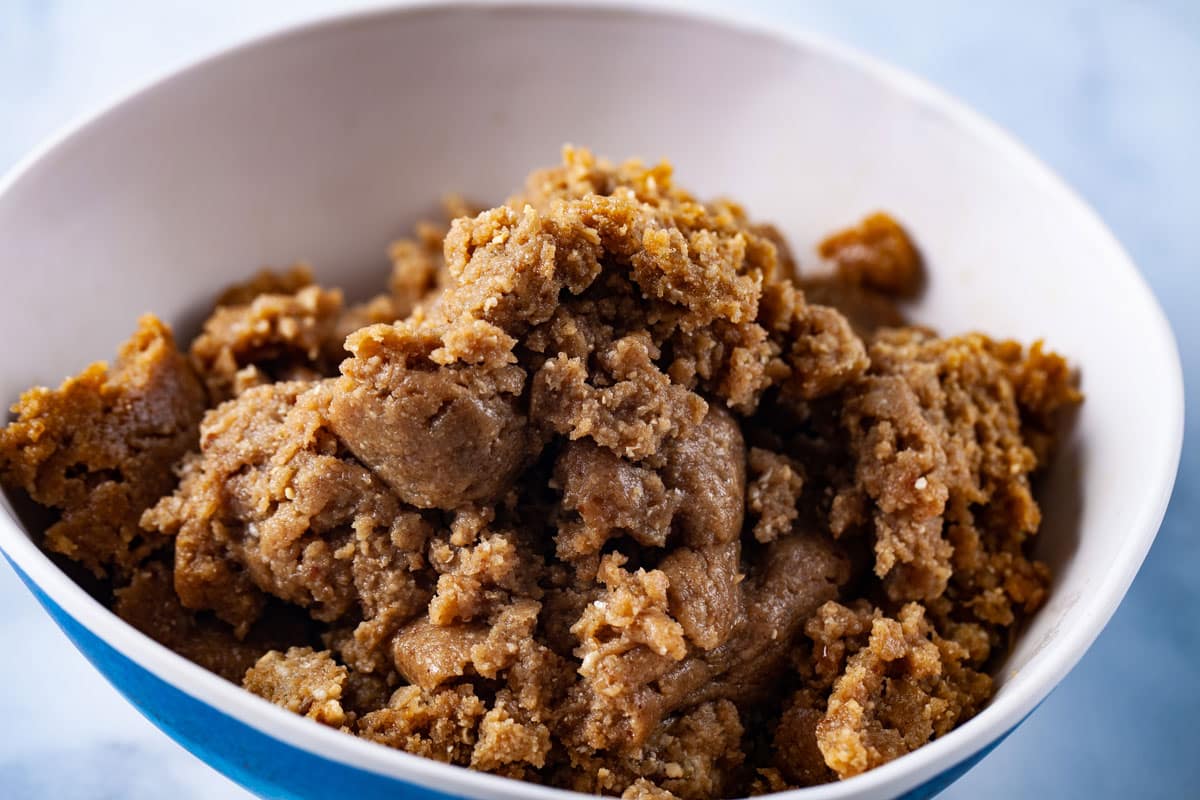 A crumbled no-bake tart crust in a bowl.