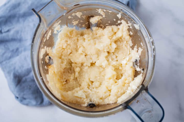 Pureed cauliflower florets in a Vitamix blender.