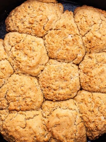 Rosemary Drop biscuits in a cast-iron skillet.