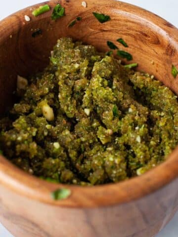 Picada pesto in a small bowl.