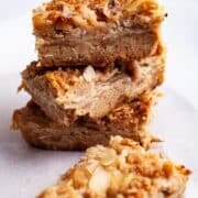 Almond flour rhubarb cookie bars stacked on top of each other.