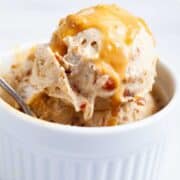 Salted date peanut butter nice cream served in a ramekin.