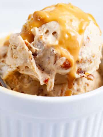 Salted date peanut butter nice cream served in a ramekin.