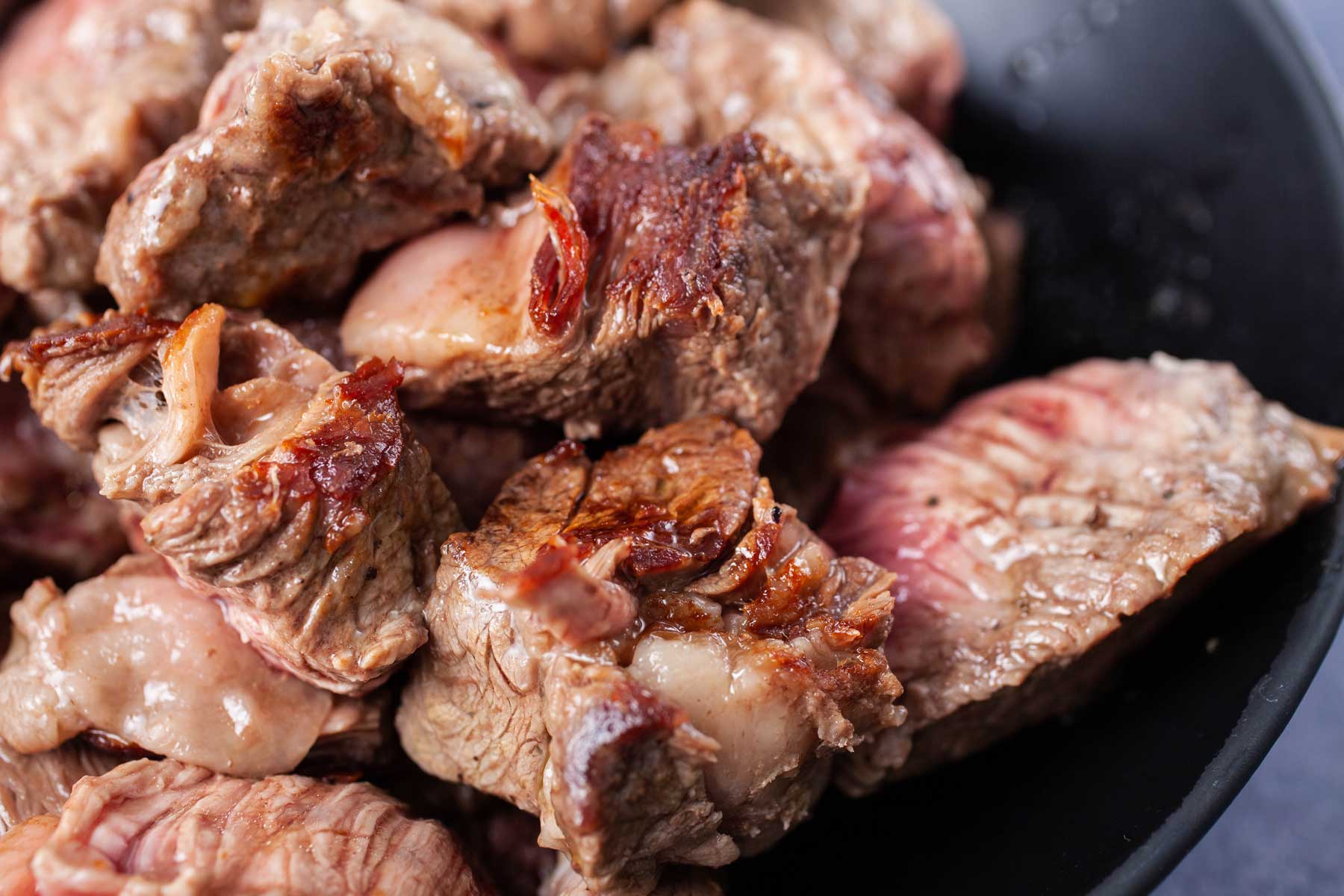 Seared beef on a plate.
