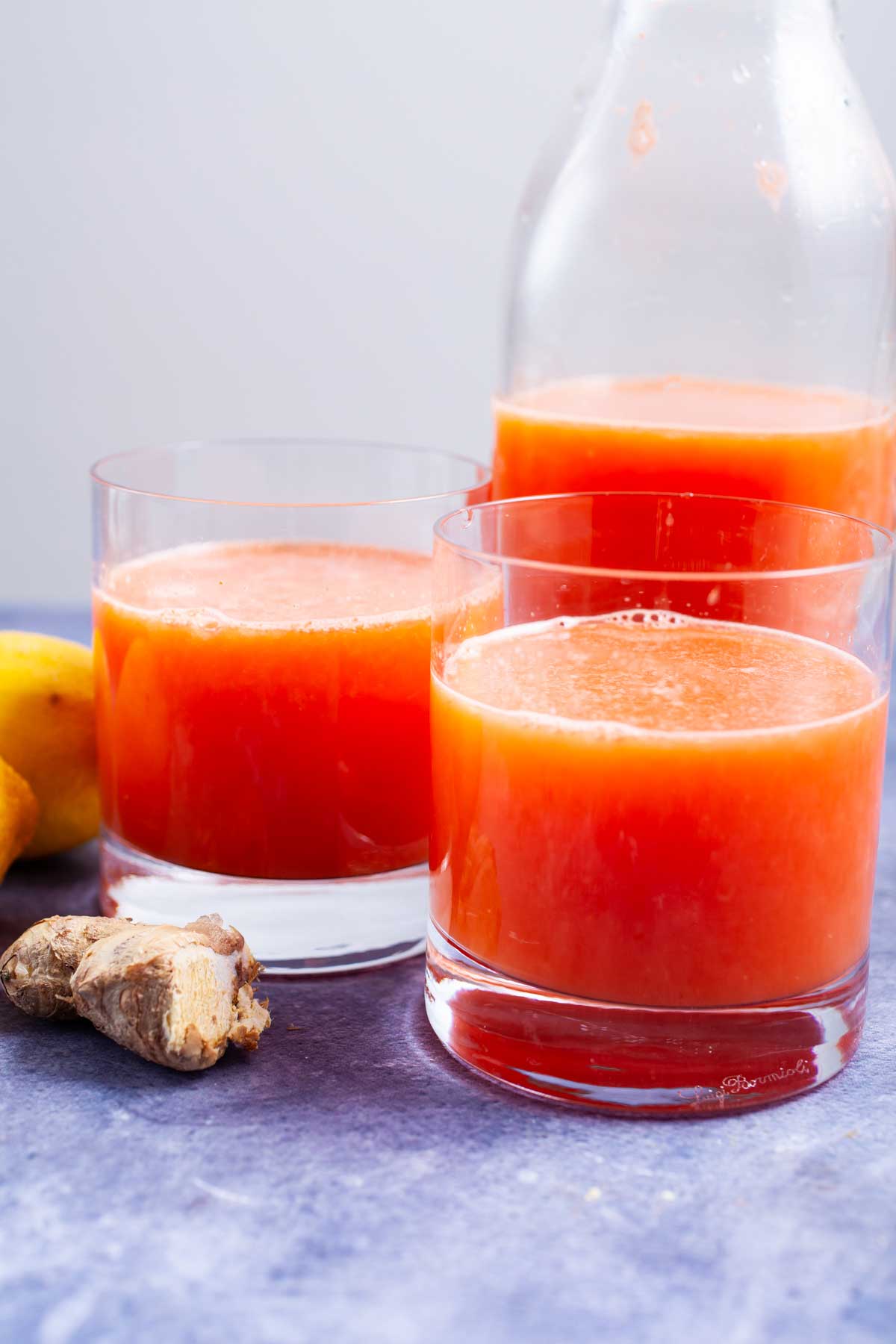 Grapefruit juice served in glasses.