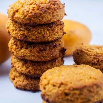 Mango cookies stacked on top of each other.