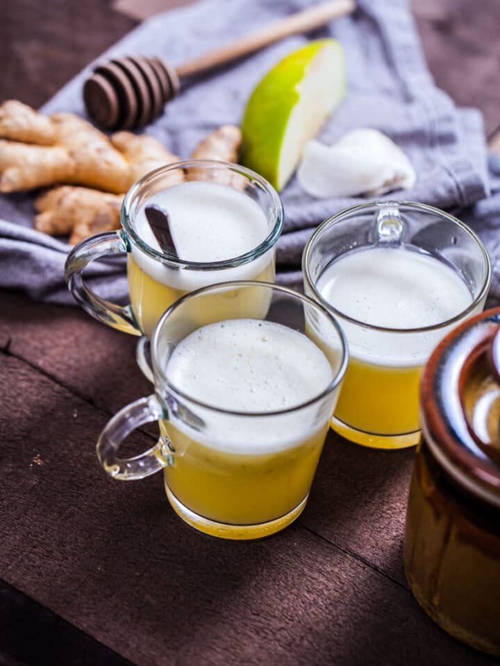 Three homemade wellness shots displayed