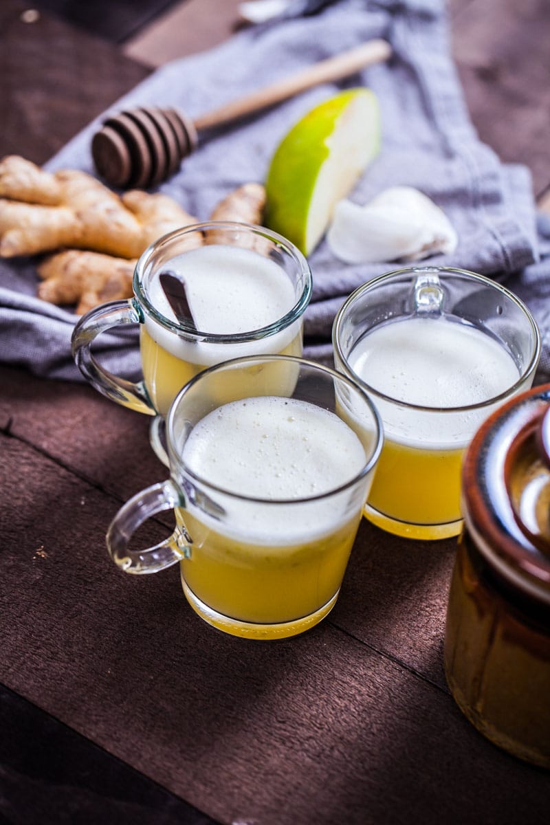 Three homemade wellness shots displayed