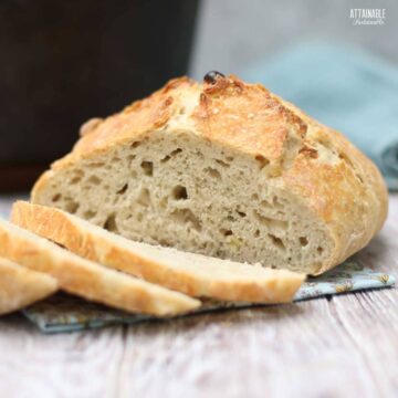 Sliced homemade bread on a table.